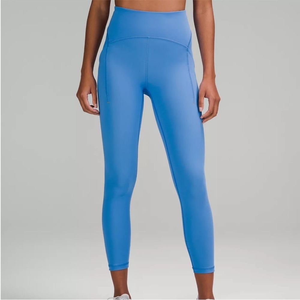 Lululemon • Power Thru High Rise Blue Tight 25" Four Way Stretch Sz 0 Pockets